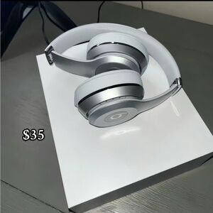Silver and White Headphones